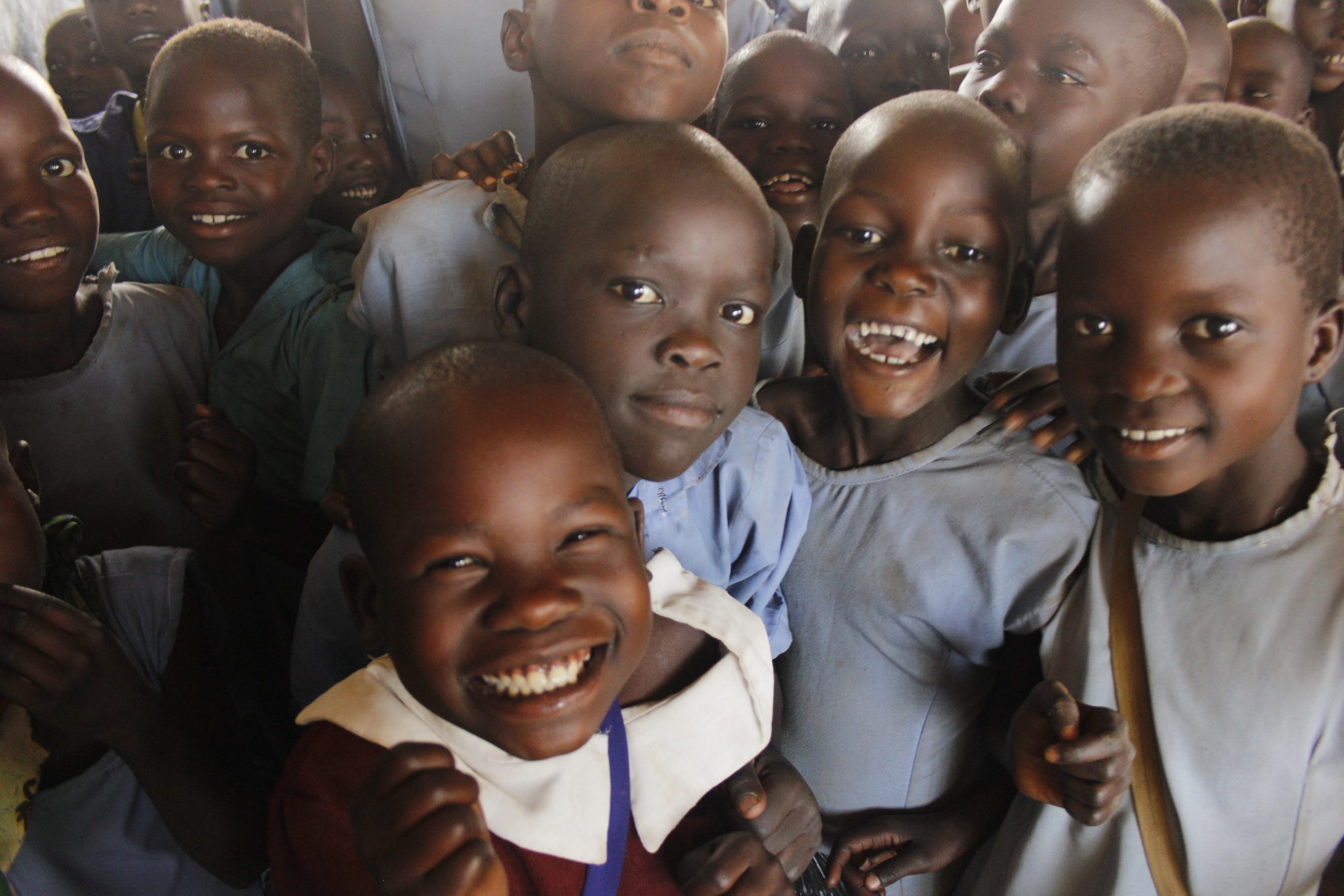 Geoffrey's story for African Revival showing a group of young children smiling