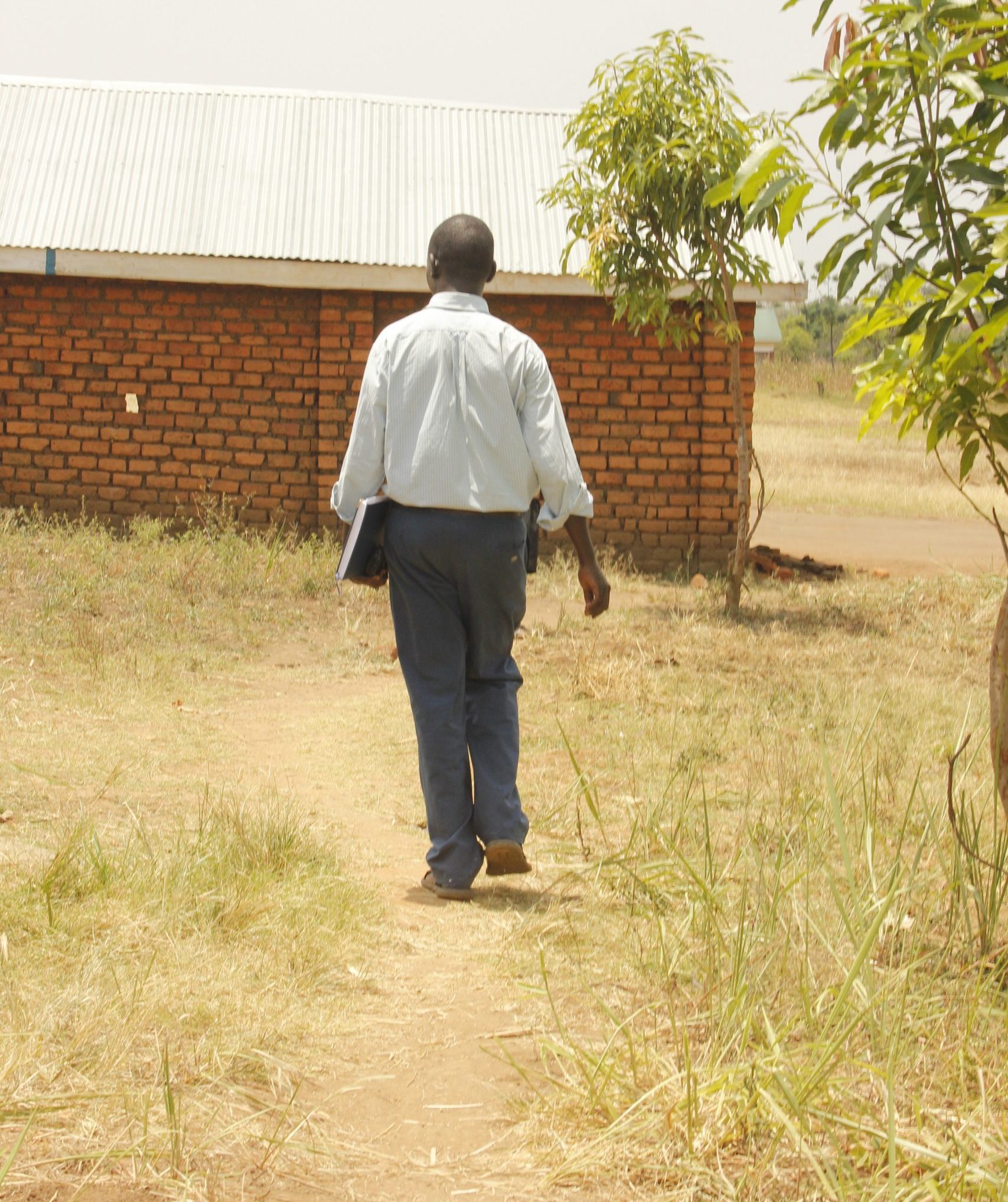 Vincent's story for African Revival showing him walking towards a constructed building