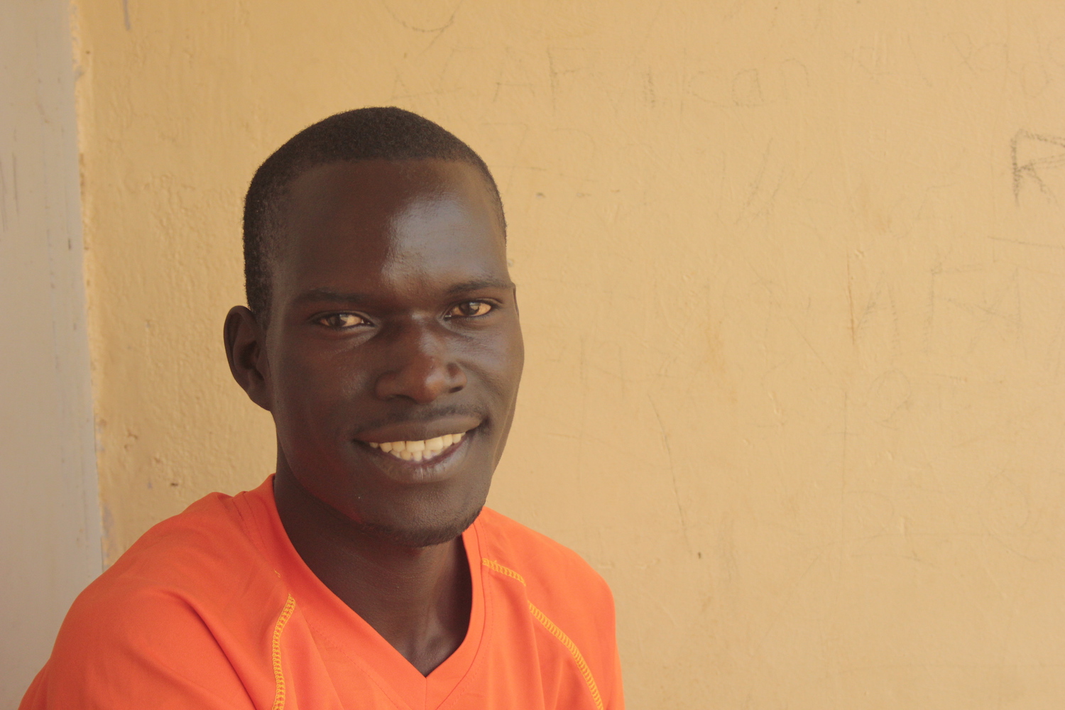 Sunday's story for African Revival showing him smiling in an orange t-shirt